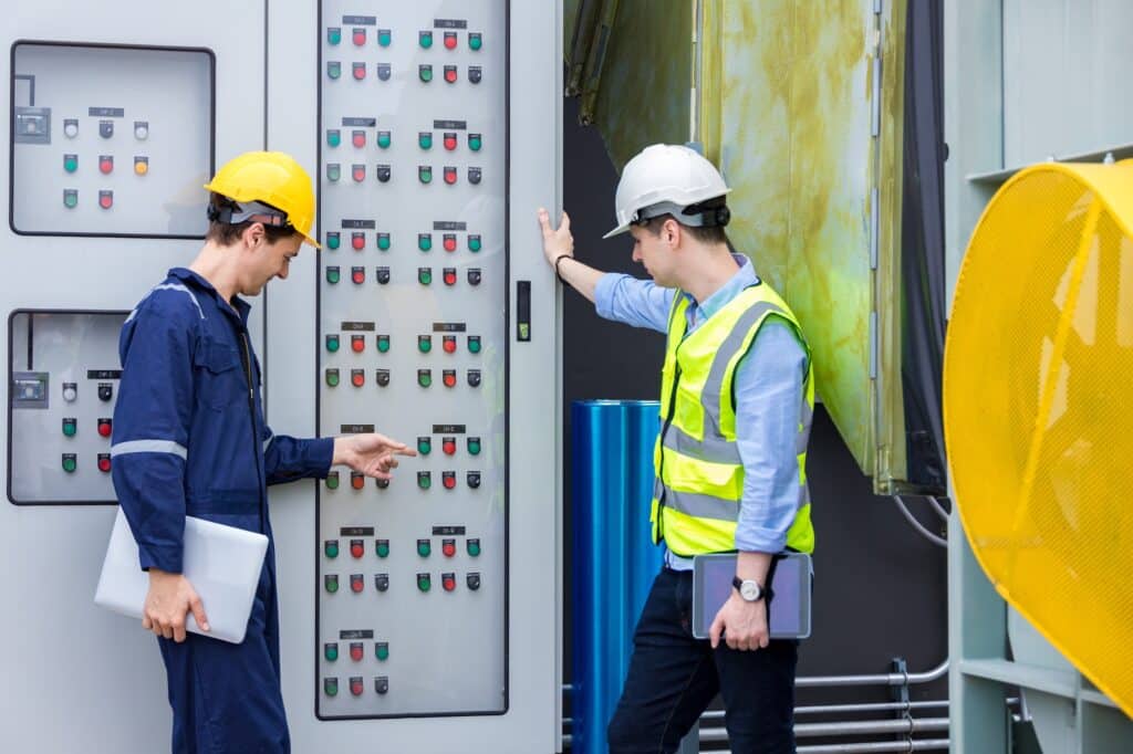 Electrical engineer working in control room.