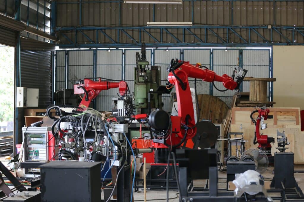 Robotics arm in the metal factory plant . it's the welding robotics units equipment.